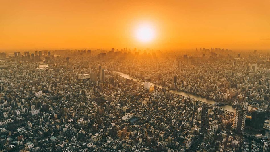 rising-sun-over-asiatic-city-skyline